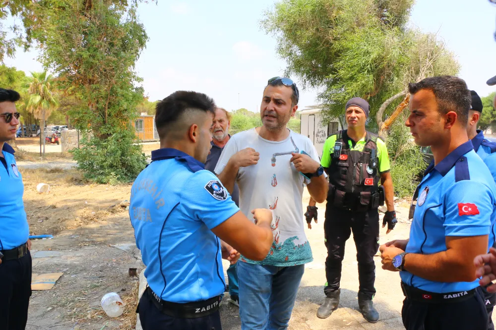  Lara sahilinde kamusal alanları  işgal eden karavanlar tahliye edildi