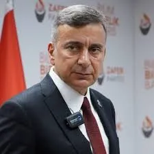 Azmi Karamahmutoğlu, 